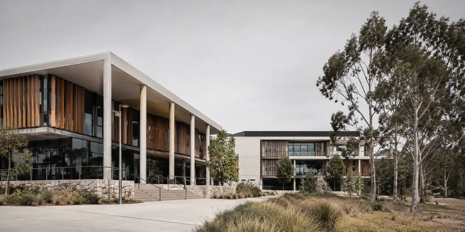 Contemporary Australian university building and academic walkway in natural daylight